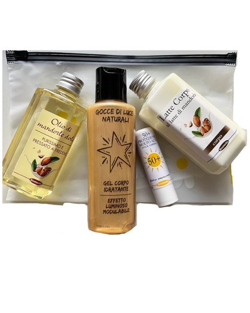 Kit idratazione profonda: olio di mandorle dolci puro pressato a freddo, latte corpo alla mandorla, stick labbra SPF 50+ e gel corpo illuminante.